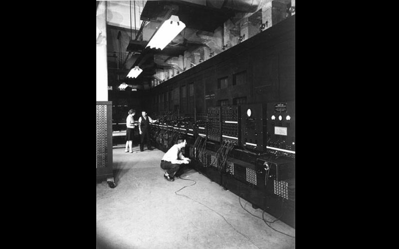 Jean & Arthur Burks work on ENIAC | Left: Arthur Burks.  Right: Unknown male engineer and Jean Jennings Bartik. Jean always found the ENIAC engineers to be extremely helpful and friendly. According to Jean, they treated her with the respect of an equal once they discovered she (and the other female programmers) were good at their jobs and, in fact, could make their own jobs easier. (U.S. Army photo from the archives of the ARL Technical Library)