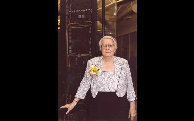 Jean and Babbage's Difference Engine | Jean Jennings Bartik stands in front of Charles Babbage's Difference Engine No. 2, which is on display at the Computer History Museum in Mountain View, Cali. Babbage, who was born in London, England on December 26, was a mathematician, philosopher, inventor and mechanical engineer who originated the concept of a programmable computer. (Courtesy of Dr. Jon Rickman, Vice President of Information Technology, Northwest Missouri State University.)